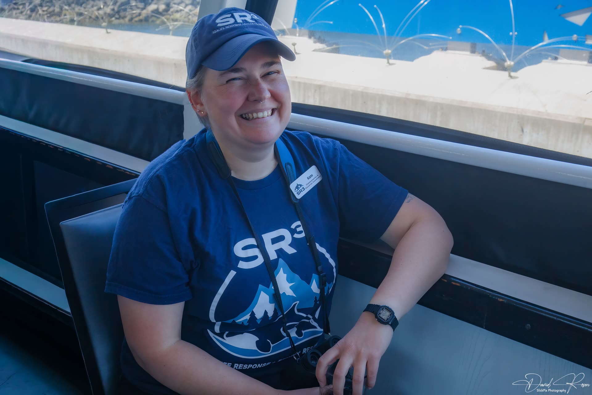 Presenter Kate Hruby of SR3 sits near the cabin window during the cruise.